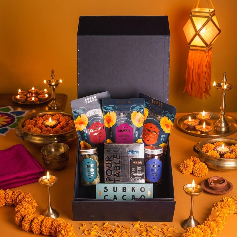 The Deepam Taufah hamper, styled with diyas and marigolds