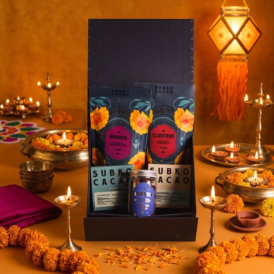 The Mogra Taufah hamper, styled with diyas and marigolds